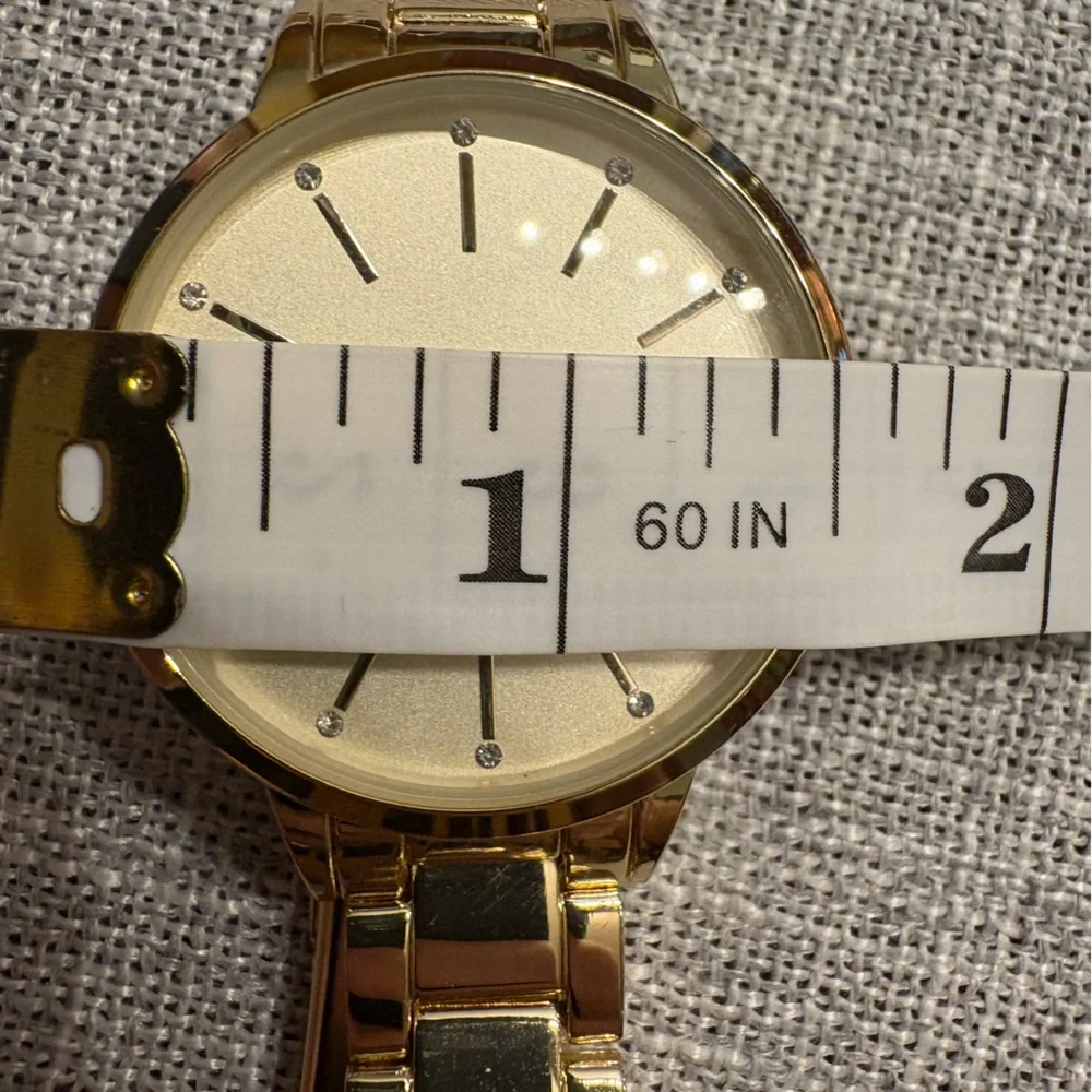 Nine West Women's Quartz Gold-Tone Alloy Link Bracelet Watch, 36mm
